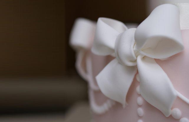 Close up bows on cake